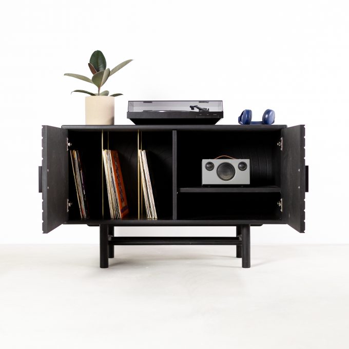 black record cabinet with grooved doors